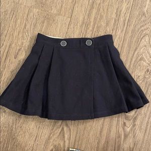 Tag on Mayoral girls navy pleated skirt. Sz 5